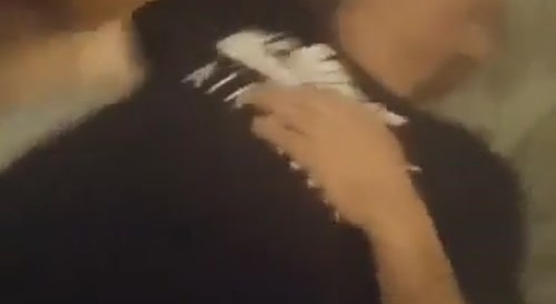 Drunk man pee on sleeping man