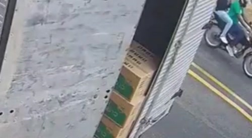 Scooter collides with truck