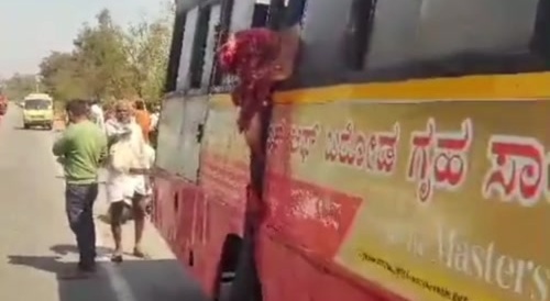 She stuck her head outside the bus