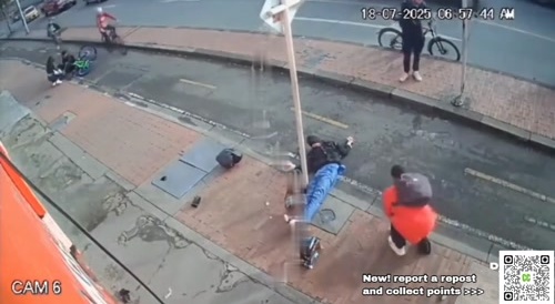 biker falls of his bike