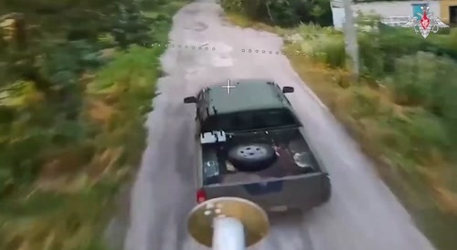 russian fiber optic drone striking a jammer truck