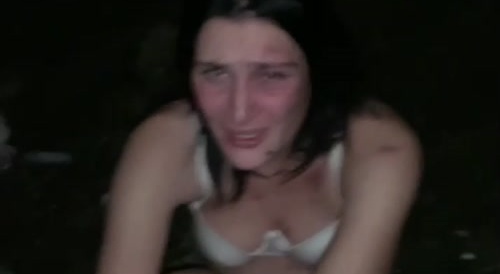 woman getting her hair cut near a dead person