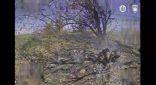 two russians try to hide among the dead