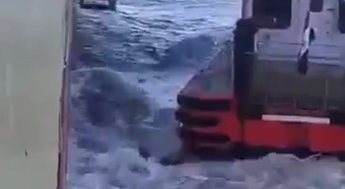 This pilot loses footing during the ship transfer.