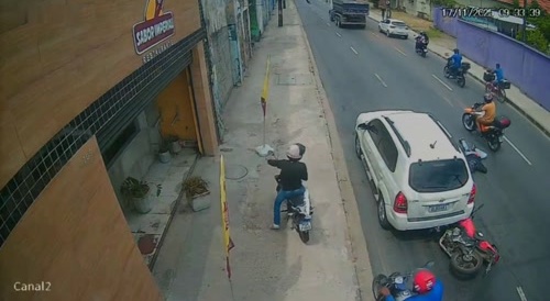 biker kissed by truck