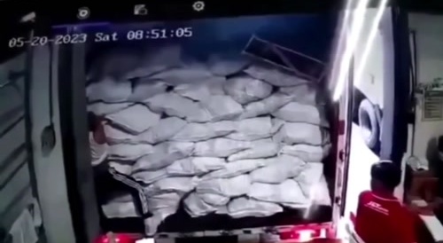 Someone getting pinned between the loading dock building and truck