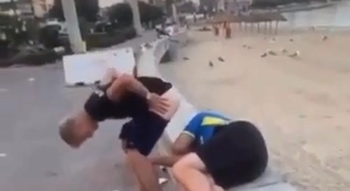 Guy shits on drunkard