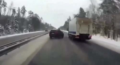 Car crashes into truck