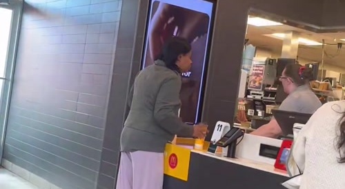 Woman throws scalding hot coffee at employee