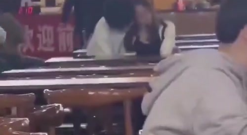 Guy fondling some girl in public