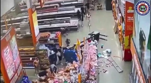Forklift tips over in supermarket