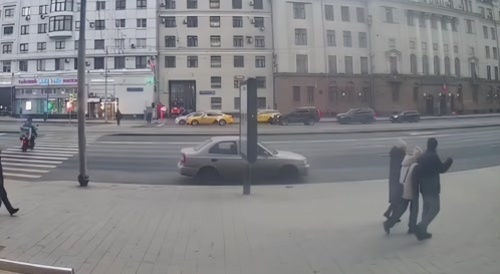 Russian Cops Send A Biker Flying