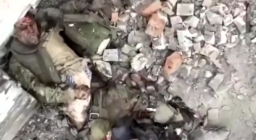 Wounded Russian Soldier with an Exposed Spine Dies on Fire