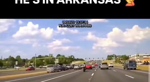 Police hit Motorcyclist