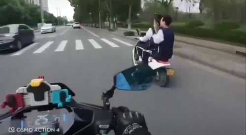 Scooter rider crashes due to not paying attention