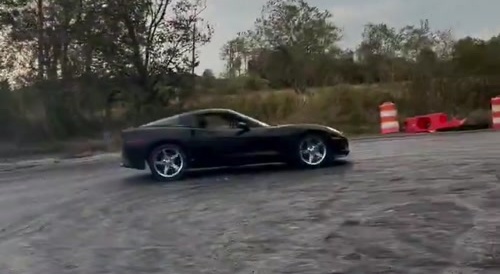 Guy falls out of car drifting