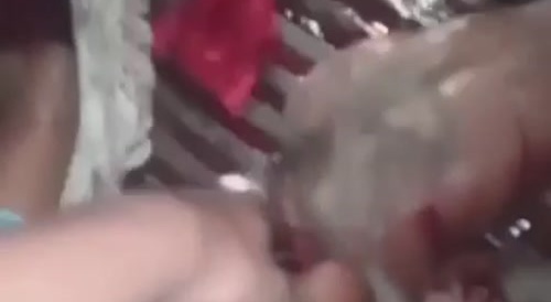 Haitian gang members showing off their kill count