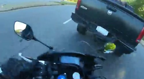 Reckless driver spins motocyclist in air