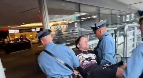 Man touching himself at concert gets carried out like he killed 20+ people.