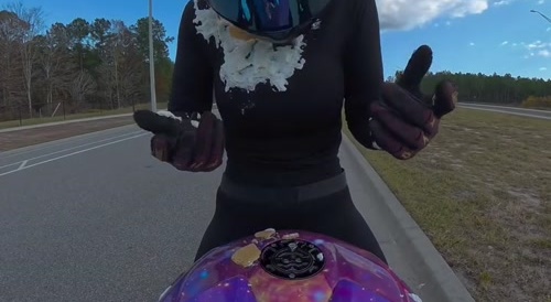 Girl on bike gets pied