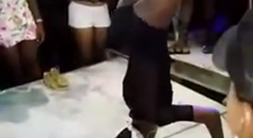 Dancing woman snaps neck