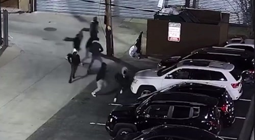 Parking lot shootout caught on CCTV