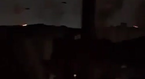 Gunfire and U.S. helicopters over Caracas, Venezuela.