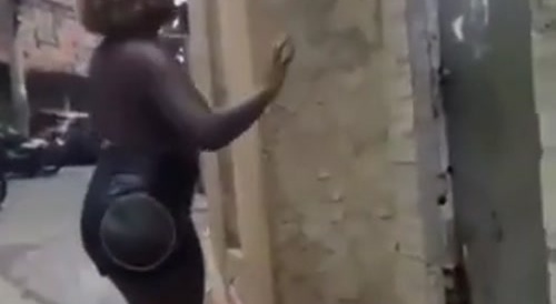 Drunk woman falls inside someone's house.