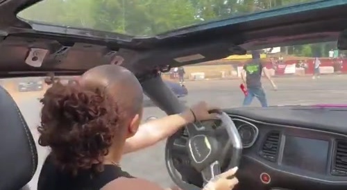 Girl drifting hits guy