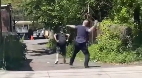 Old Man Rocks Younger Man