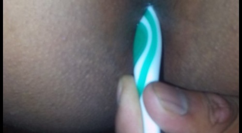 toothbrush in the ass