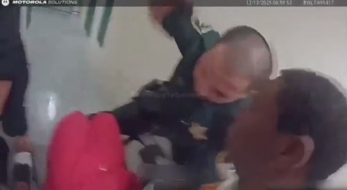 Police beating up someone who is not resisting