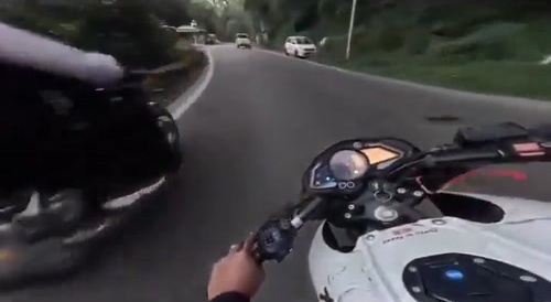 Motorcyclist gets deflected by truck into step