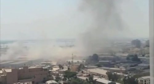 An American sailor records the Iranian strike in Bahrain.