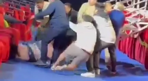 Manly Tranny Jumps Off Stage - Faceplants!