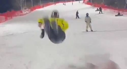 Skiier gets hit by someone falling fast