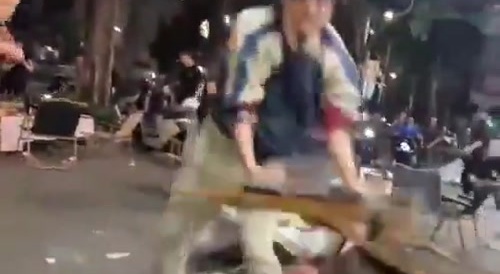 People fighting each other at in Asia