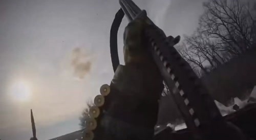 Soldier shoots drone while in back of truck