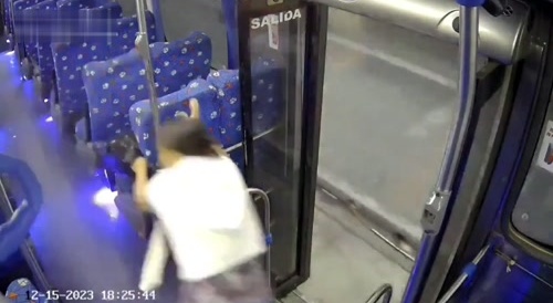 Woman falls from bus.