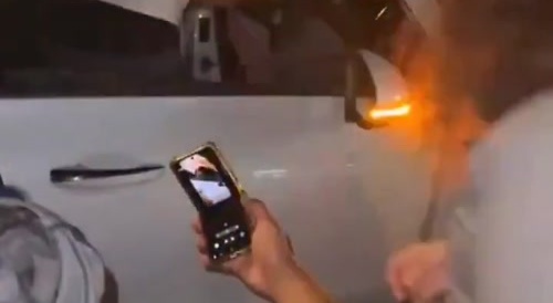 Driver gets swarmed by dozens of people