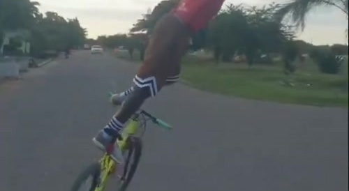 Guy riding a bike with unfathomable skill