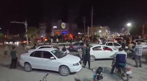 toppling statues of former Supreme Leader