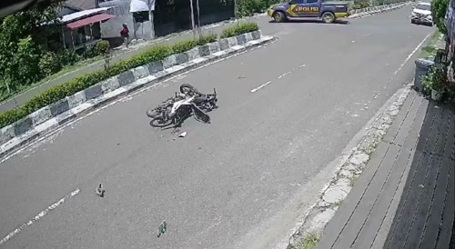 Biker Hits Road Divider & Goes Flying!
