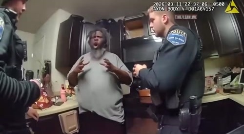 Police kill man reaching for officers gun.