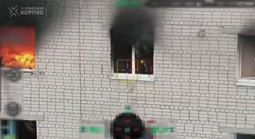 Soldier Shot While Jumping From Burning Building