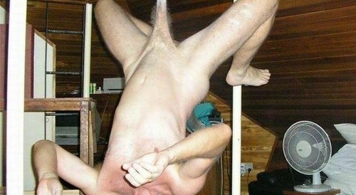 hanging by the testicles