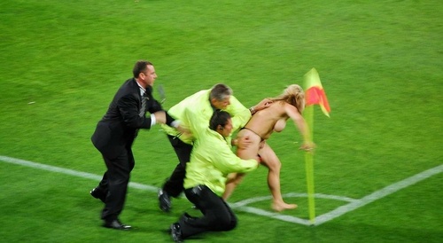 Naked woman invades stadium
