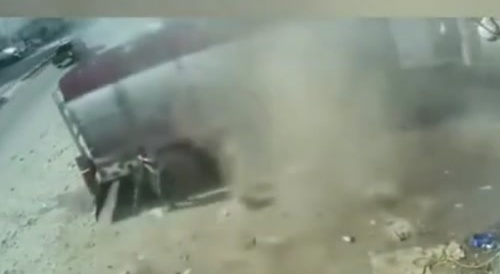 Tire explodes and man disappears