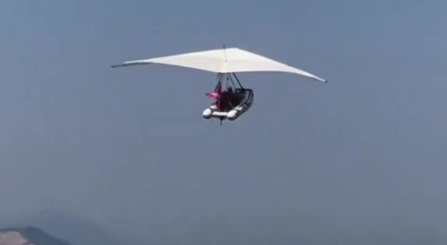 Someone successfully combines boat with powered-glider.