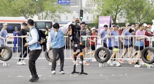 Humanoid falls during marathon